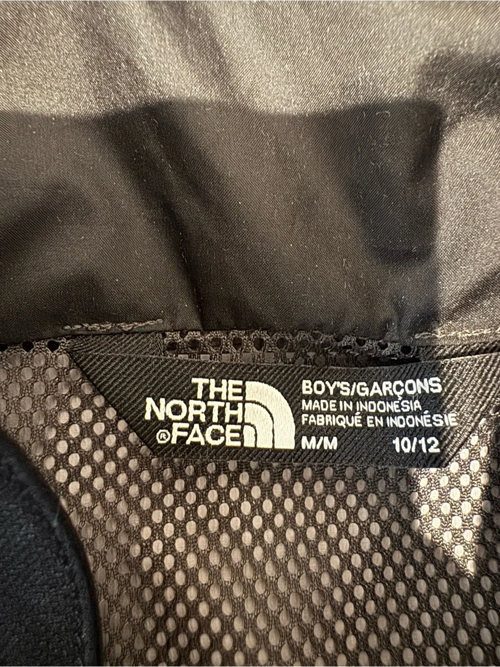 The North Face Kids Black Hooded Rain Jacket with Gray Panels